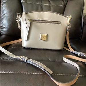 Dooney & Bourke Domed Crossbody leather bag.